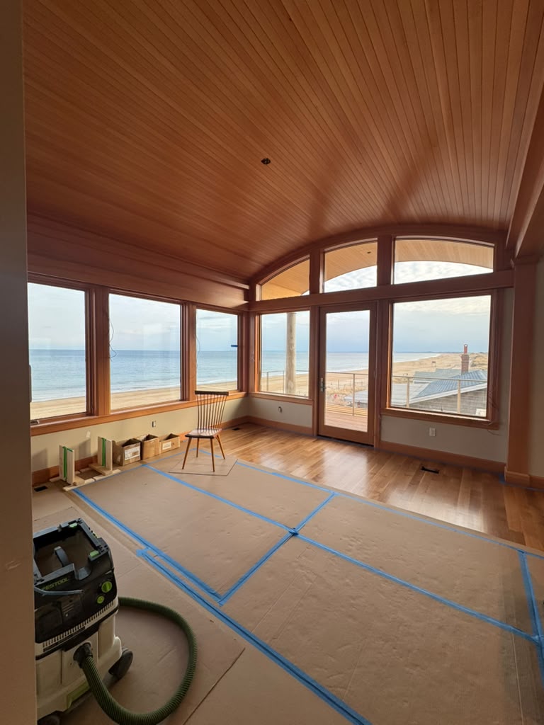 Coastal residence with custom wood ceiling